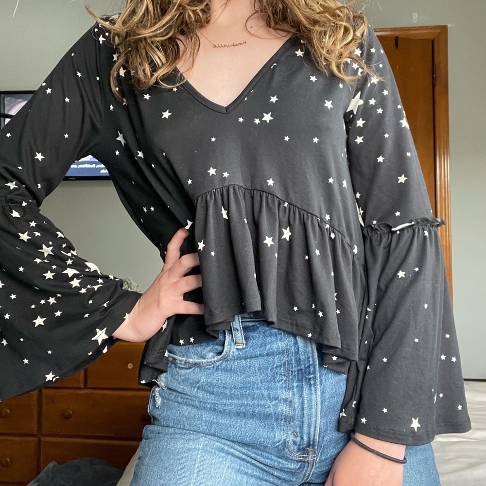 NWOT Altar’d State star print shark bite peplum top